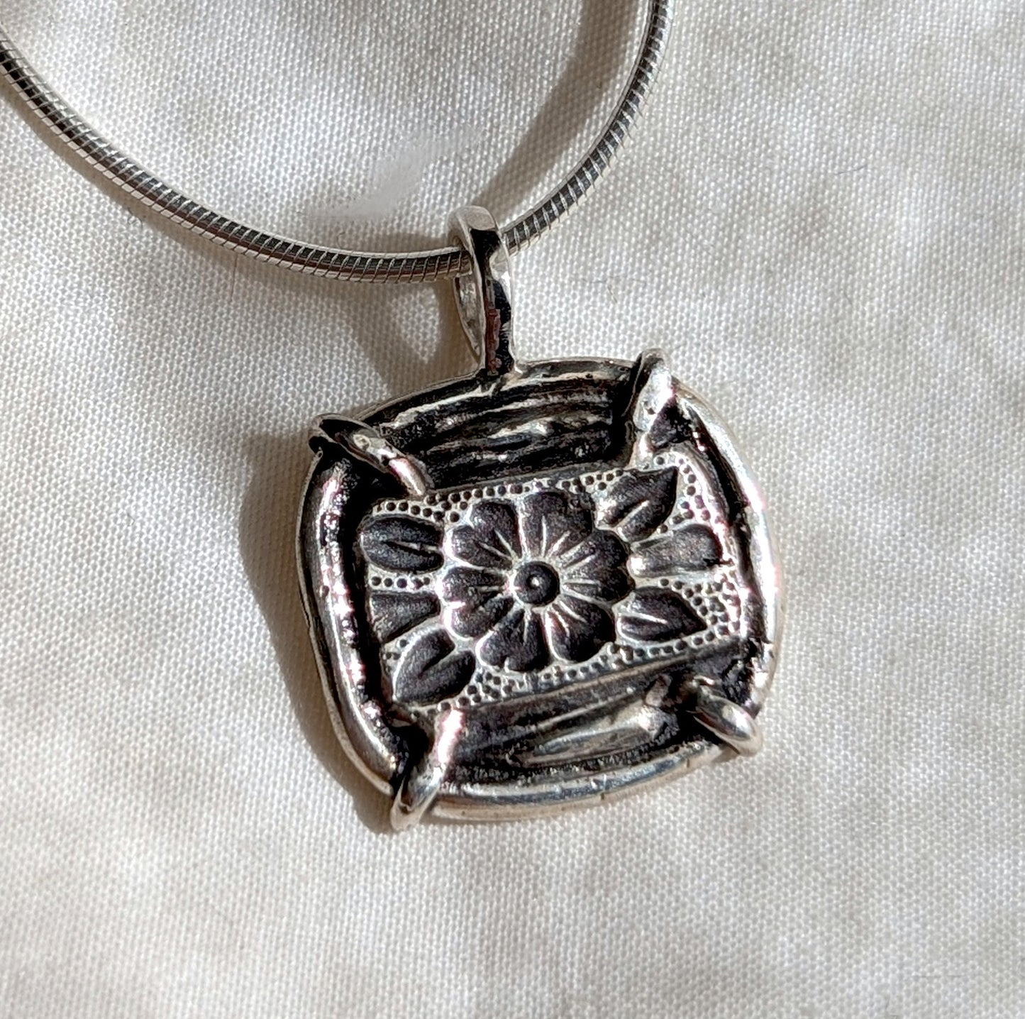 floral pendant