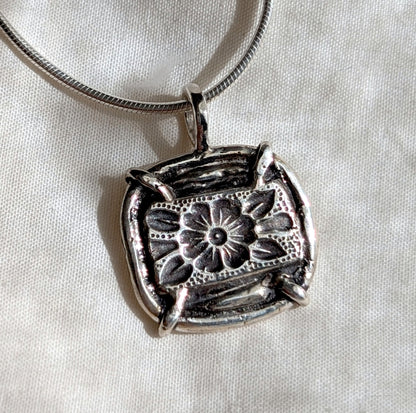 floral pendant