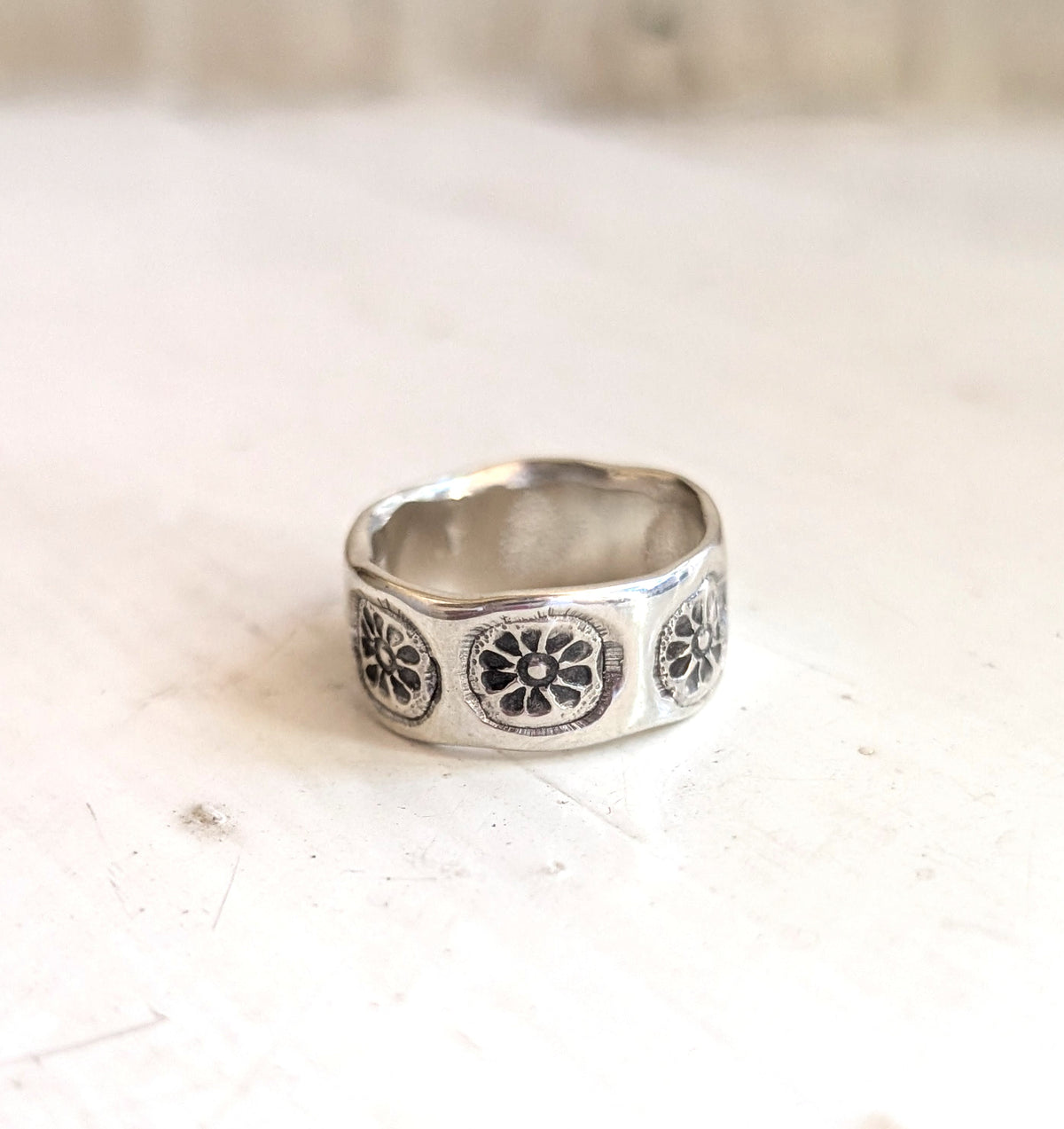 stamp of spring knuckle ring